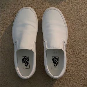 white slip on vans